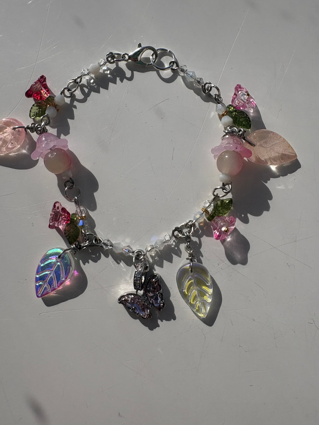 Butterfly blossom charm bracelet